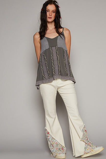 V-neck sleeveless big ruffle front knit top